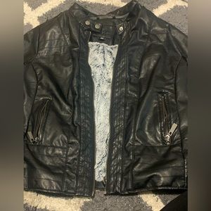Leather Jacket. With fur inside.